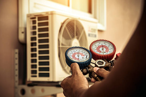 Professional Heat Pump Repair technician working in Thomasville, AL